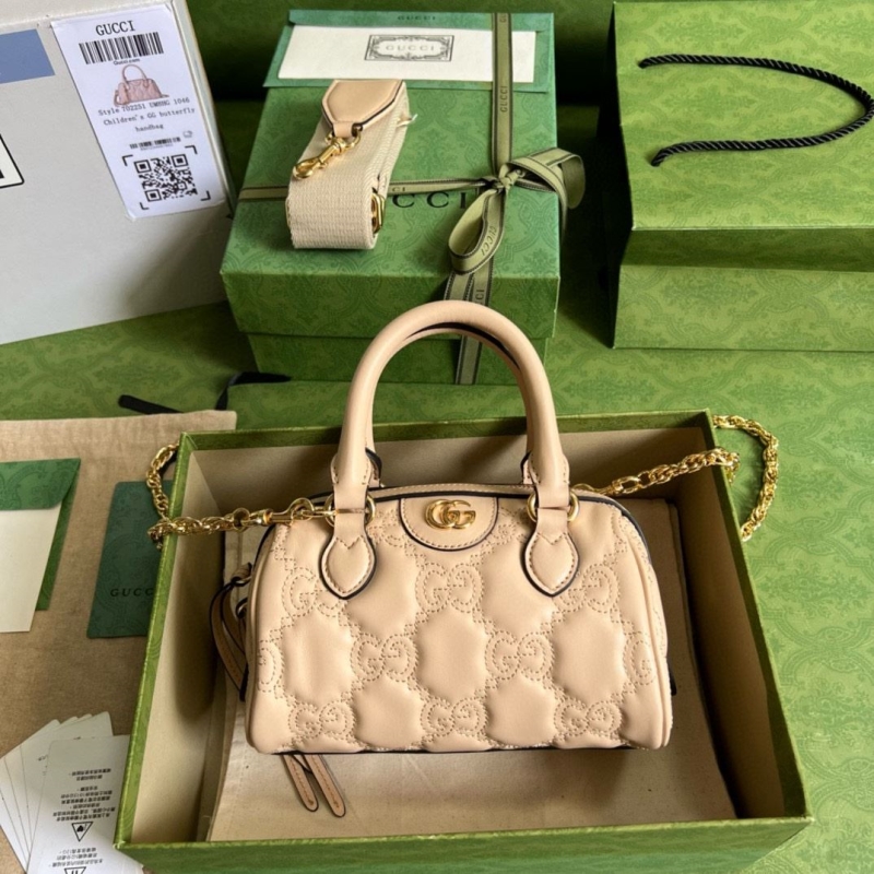 G*u*i top handle bags